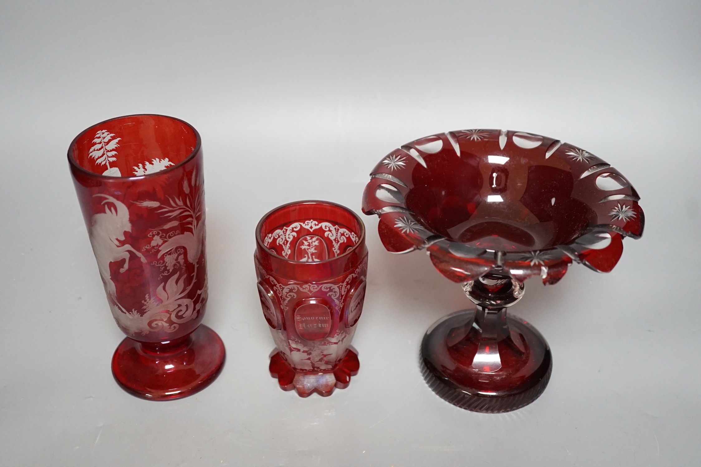 Two Bohemian Red stained glass vases and a comport, tallest 17cms high